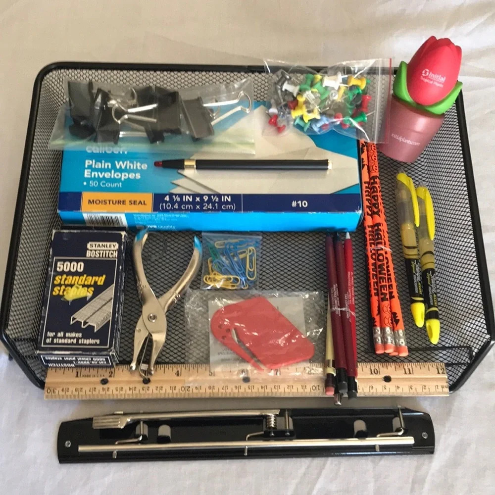 Mesh letter tray and various office supplies